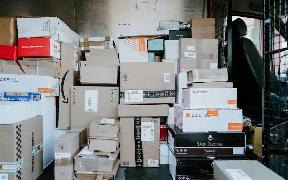 Parcels stacked in the back of a delivery van